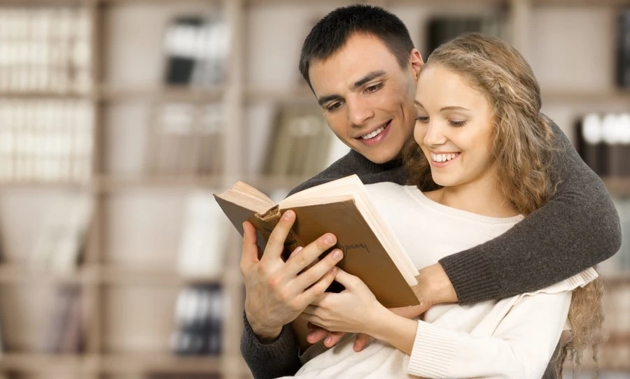 Man Reading Bible with Woman - FarmersOnly